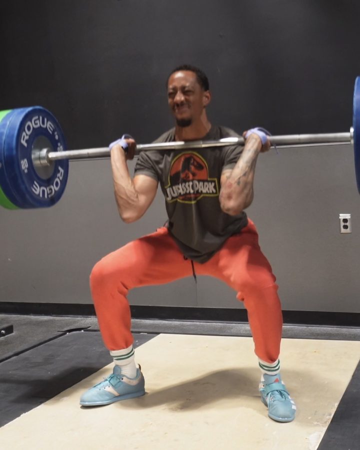 Jonathan Clark performing a barbell back squat
